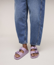 woman wearing birkenstock arizona big buckle mauve 