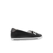 black leather flats embossed