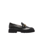 womens black loafer with gold buckle detail